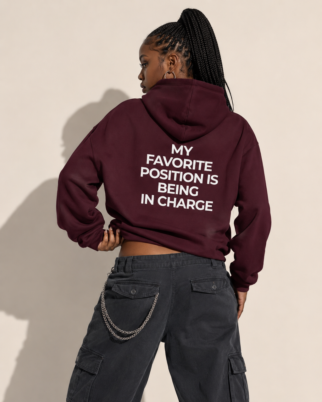 Burgundy feminist hoodie with cream My Favorite Position Is Being in Charge back print