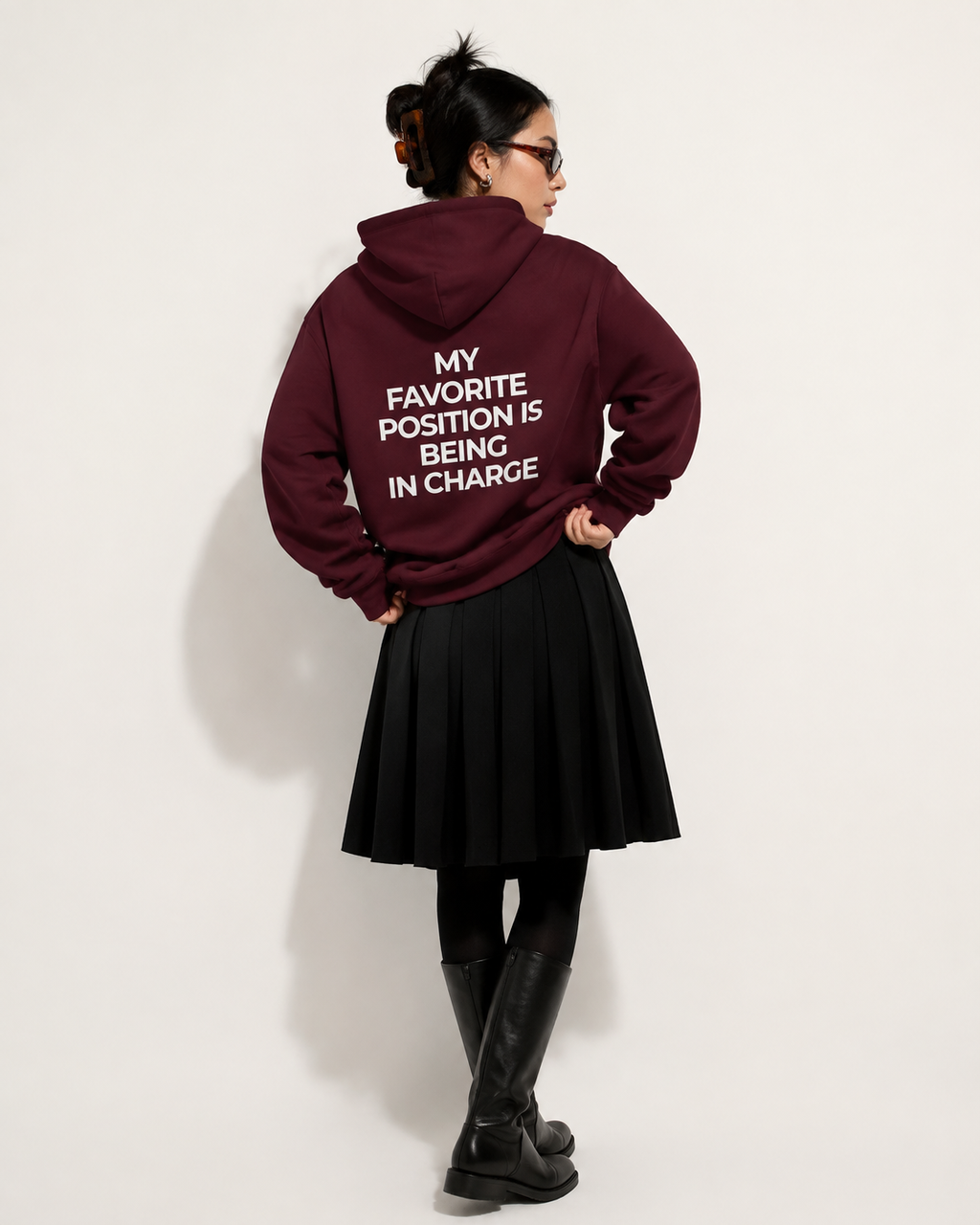 Burgundy feminist hoodie with cream My Favorite Position Is Being in Charge back print