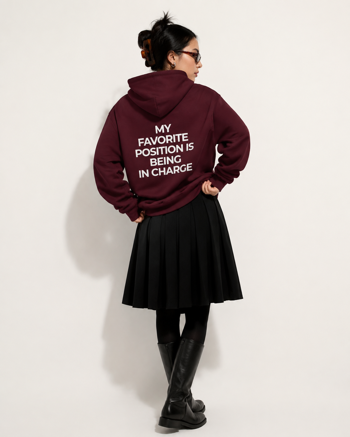 Burgundy feminist hoodie with cream My Favorite Position Is Being in Charge back print