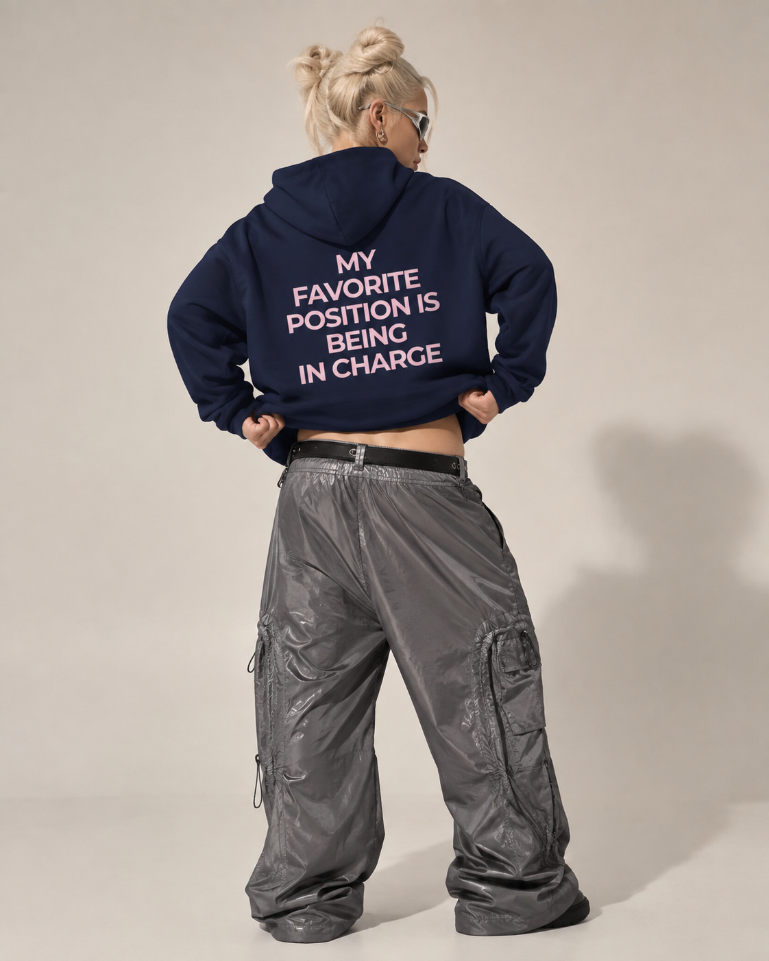 Navy feminist hoodie with pink My Favorite Position Is Being in Charge back print