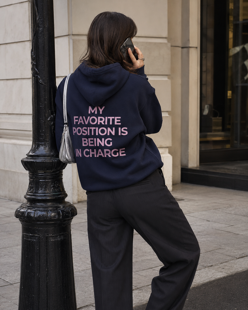 Navy feminist hoodie with pink My Favorite Position Is Being in Charge back print