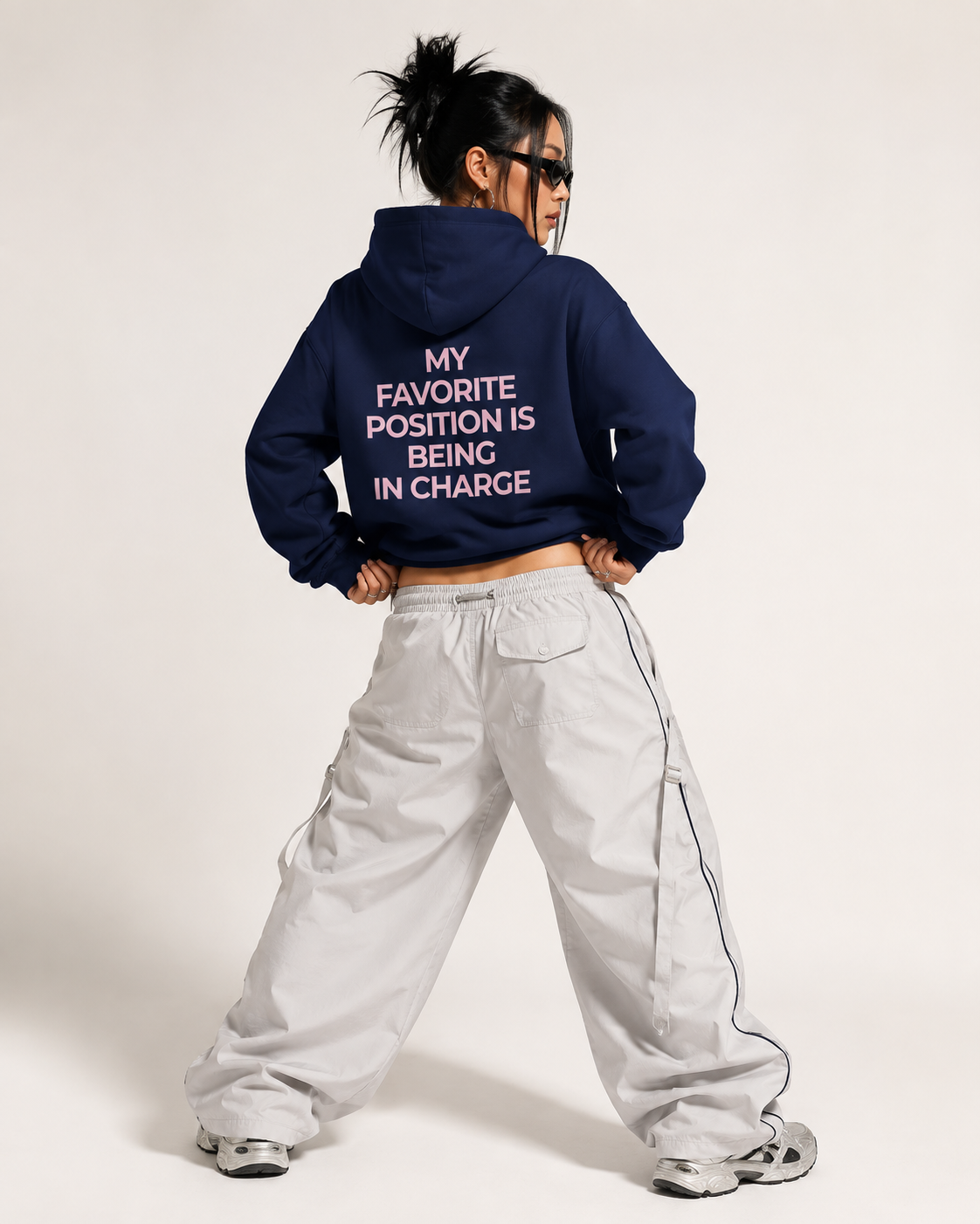 Navy feminist hoodie with pink My Favorite Position Is Being in Charge back print