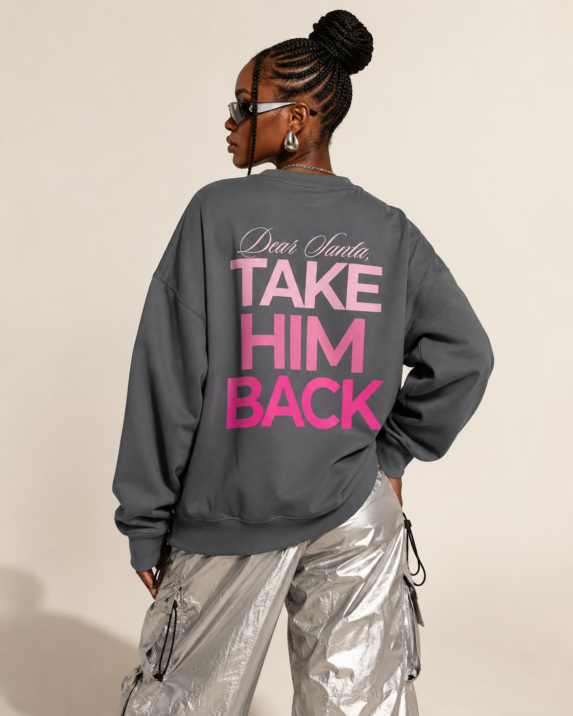 Close back view of a charcoal Dear Santa Take Him Back sweatshirt with pink lettering