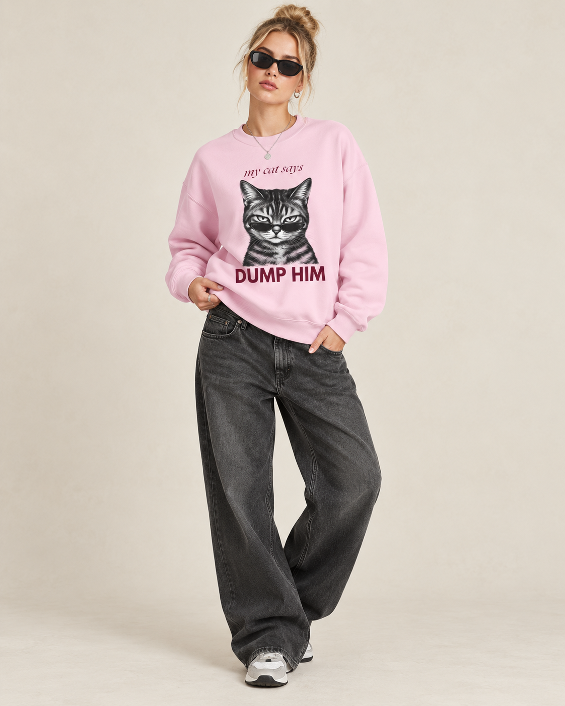 Light pink My Cat Says Dump Him sweatshirt styled with dark baggy jeans