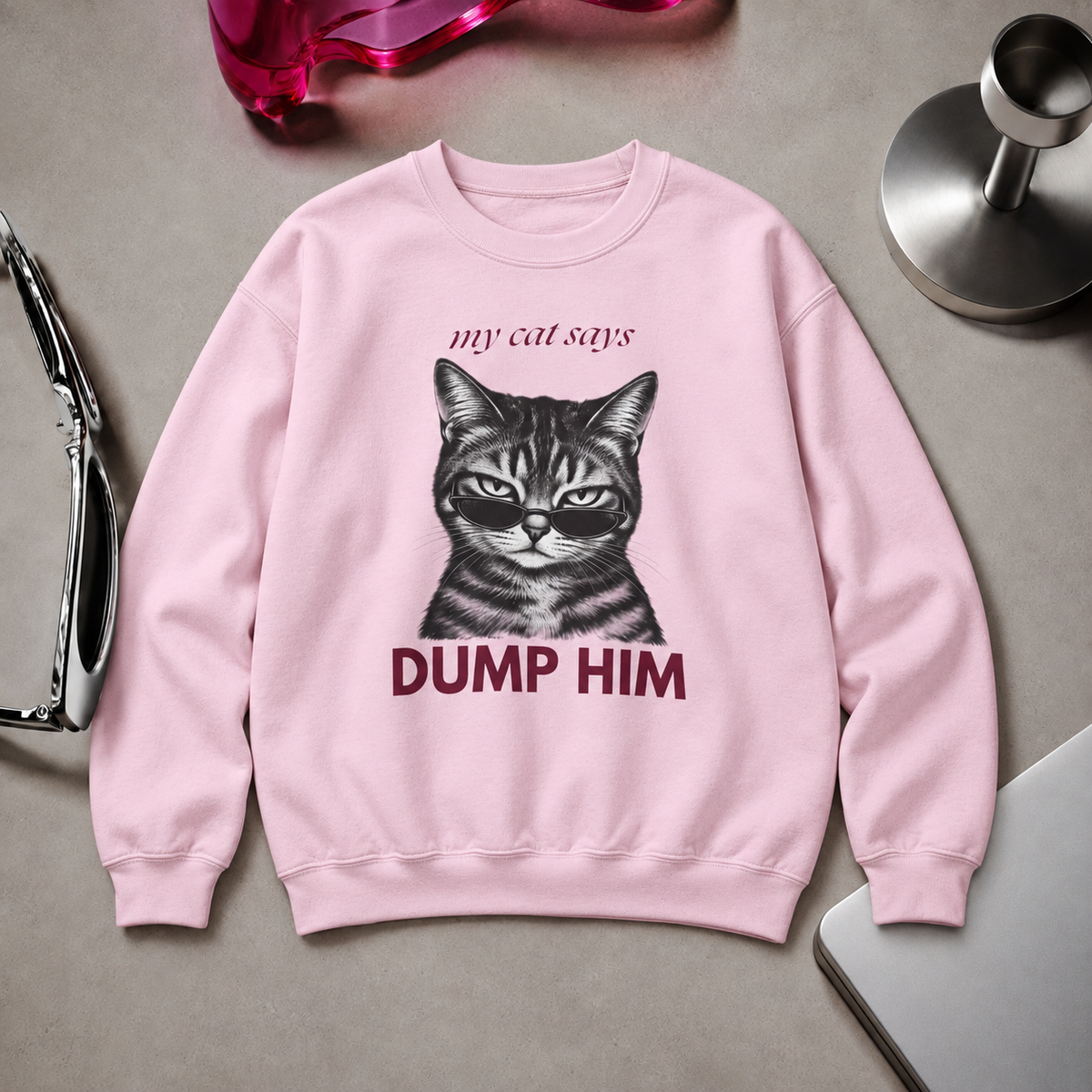 Light pink cat graphic sweatshirt displayed as a flat lay