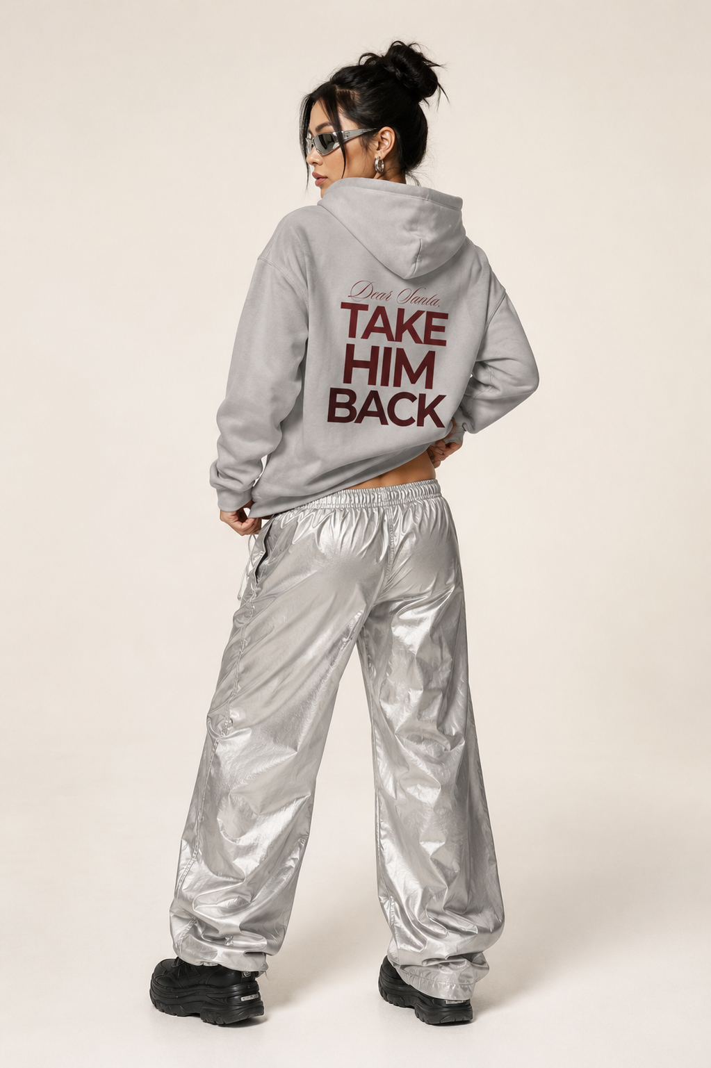 Cream Dear Santa Take Him Back hoodie styled with silver baggy trousers